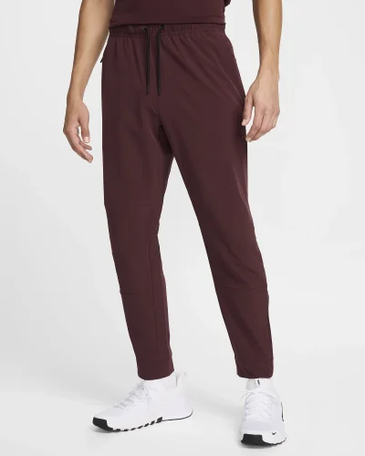 Nike Unlimited Dri-FIT Zip Cuff Versatile Trousers Burgundy Karla